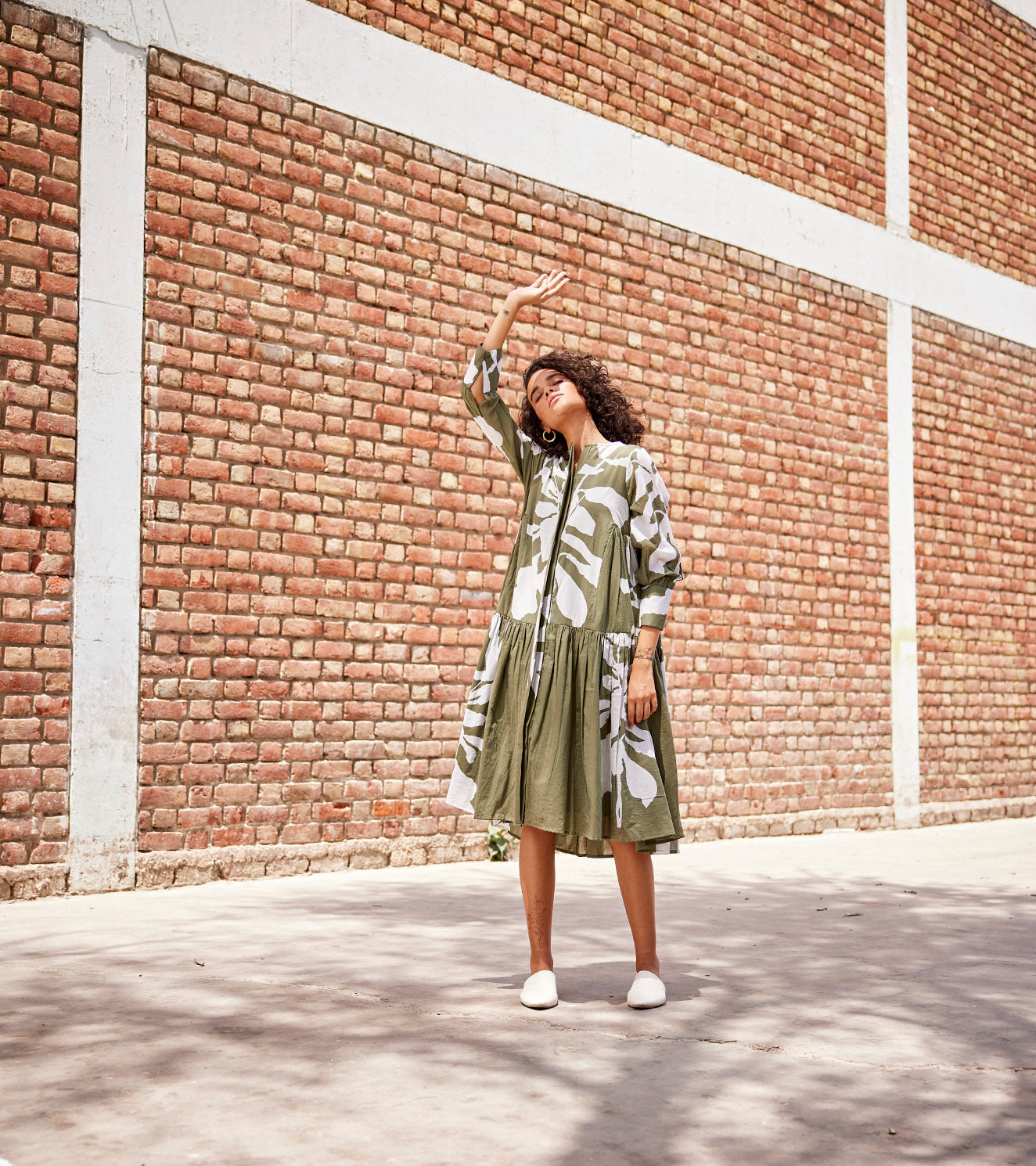 Green Mulmul Tiered Cotton Shirt Dress by Khara Kapas with An Indian Summer, An Indian Summer by Khara Kapas, Casual Wear, Green, Khara Kapas, Mulmul, Mulmul cotton, Prints, Relaxed Fit, Shirt Dresses, Tiered Dresses, Womenswear at Kamakhyaa for sustainable fashion