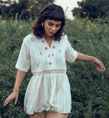 White Floral Embroidered Tunic Top by The Loom Art with Embroidered, July Sale, July Sale 2023, Natural, Organic, Party Wear, Peplum Tops, Permanent Vacation by The Loom Art, Regular Fit, Tops, White, Womenswear at Kamakhyaa for sustainable fashion