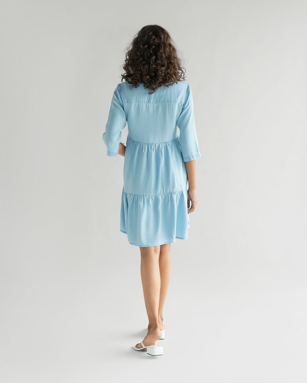 Light Blue Tiered Dress by Reistor with Blue, Casual Wear, Denim, Denim Restored by Reistor, FB ADS JUNE, Mini Dresses, Natural, Solids, Tencel, Tiered Dresses, Womenswear at Kamakhyaa for sustainable fashion