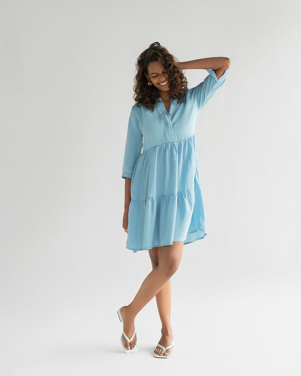Light Blue Tiered Dress by Reistor with Blue, Casual Wear, Denim, Denim Restored by Reistor, FB ADS JUNE, Mini Dresses, Natural, Solids, Tencel, Tiered Dresses, Womenswear at Kamakhyaa for sustainable fashion