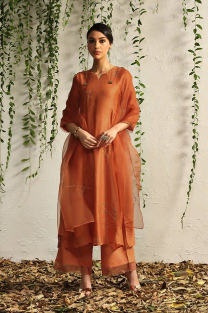 Orange Side Gathered Kurta Set of 3 by Charkhee with Best Selling, Chanderi Silk, Cotton, Embroidered, Evening Wear, Festive Wear, Kurta Pant Sets, Kurta Set with Dupattas, Mulberry by Charkhee, Natural, Orange, Organza, Regular Fit, Solids, Womenswear at Kamakhyaa for sustainable fashion