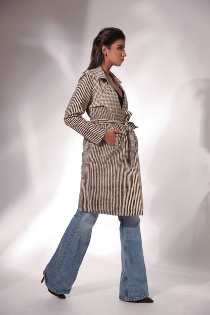 Beige Block Print Trench Coat with Belt by Keva with Beige, Black, Block Prints, Cotton, Natural, Relaxed Fit, Resort Wear, Stripes, Trench Coats, Womenswear, Zima at Kamakhyaa for sustainable fashion