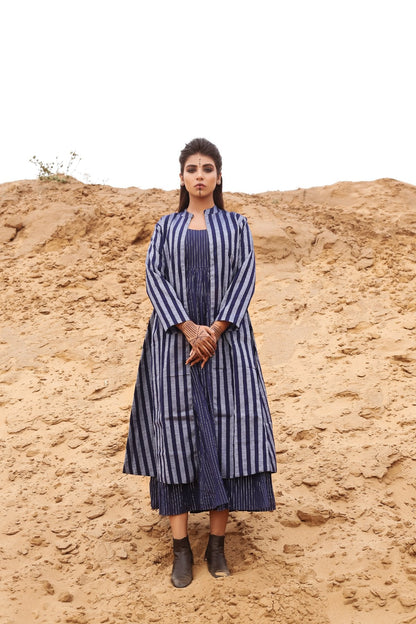 Deep Blue Striped Long Cape With Spagetti Dress - Set Of Two by Keva with Blue, Cape, Co-ord Sets, Cotton, Cotton Lurex, Desert Rose, Dress Sets, For Mother, For Mother W, Midi Dresses, Natural, Relaxed Fit, Resort Wear, Stripes, Womenswear at Kamakhyaa for sustainable fashion