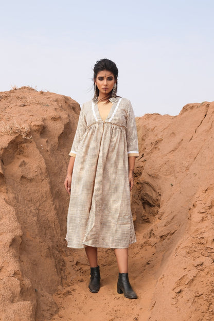 Brown Chekered Calf Length Dress With Inner - Set Of Two by Keva with Brown, Checks, Cotton, Cotton Lurex, Desert Rose, fall, Midi Dresses, Natural, Relaxed Fit, Resort Wear, Womenswear at Kamakhyaa for sustainable fashion