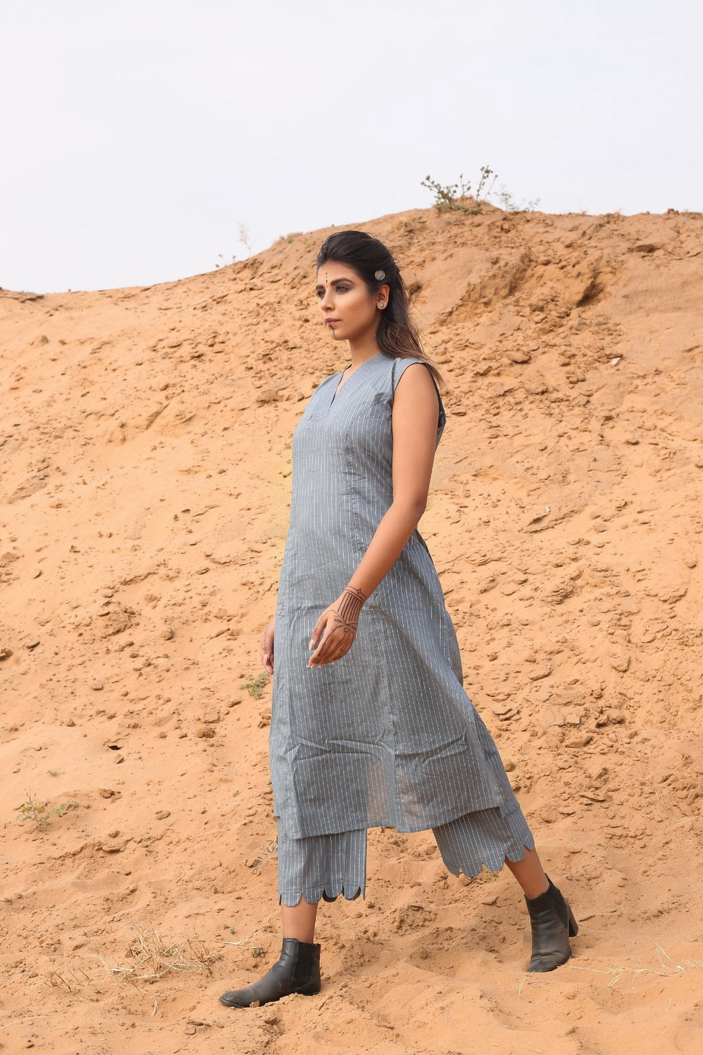 Multi-Color Striped Cape With Kurta And Pants - Set Of Three by Keva with Cape, Co-ord Sets, Cotton, Cotton Lurex, Desert Rose, Multicolor, Natural, Relaxed Fit, Resort Wear, Stripes, Travel, Travel Co-ords, Womenswear at Kamakhyaa for sustainable fashion