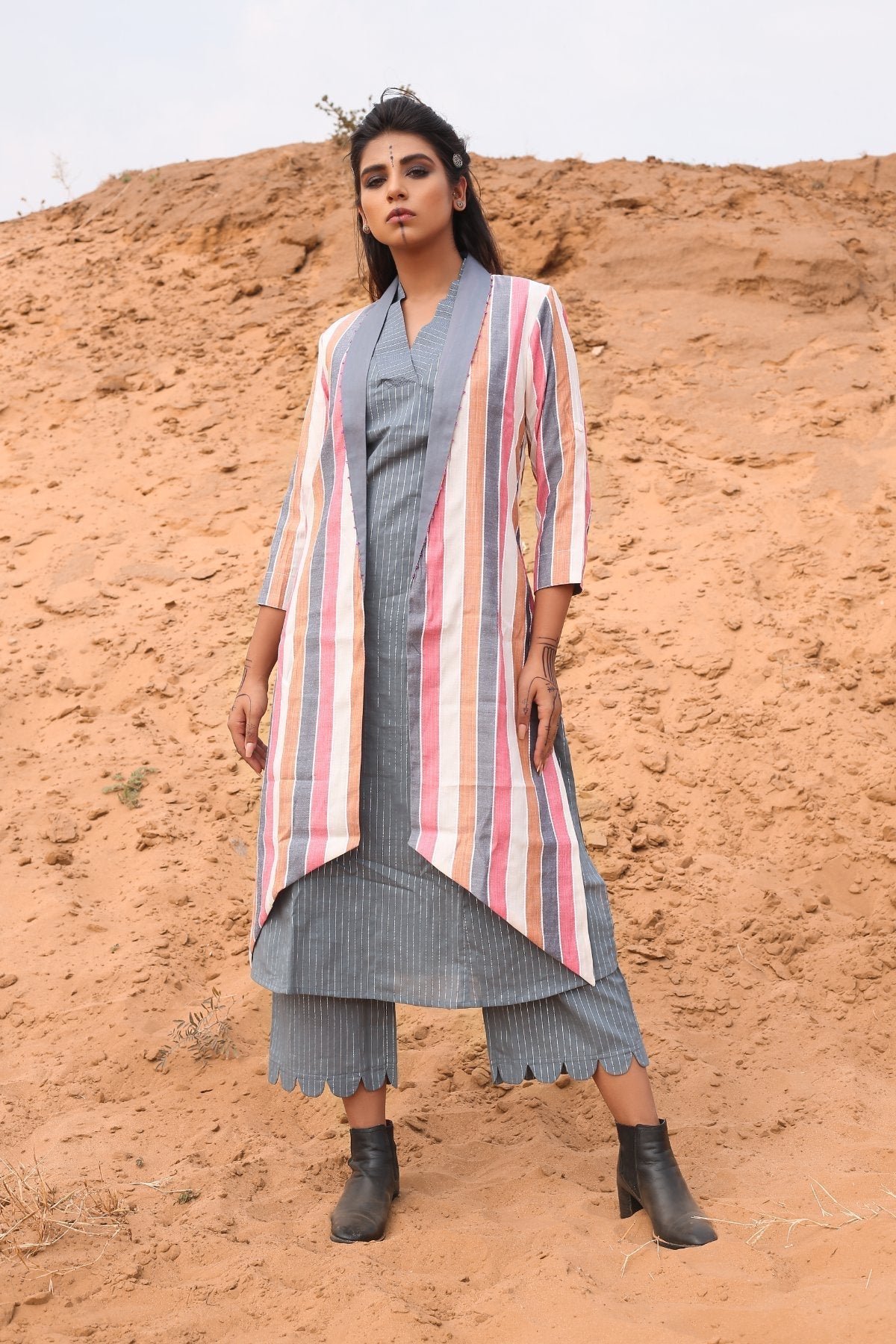 Multi-Color Striped Cape With Kurta And Pants - Set Of Three by Keva with Cape, Co-ord Sets, Cotton, Cotton Lurex, Desert Rose, Multicolor, Natural, Relaxed Fit, Resort Wear, Stripes, Travel, Travel Co-ords, Womenswear at Kamakhyaa for sustainable fashion