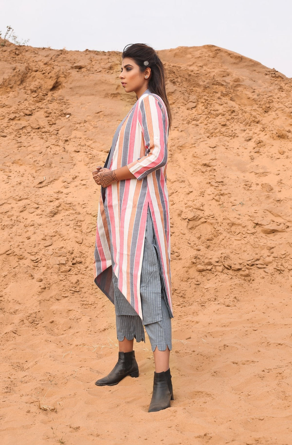 Multi-Color Striped Cape With Kurta And Pants - Set Of Three by Keva with Cape, Co-ord Sets, Cotton, Cotton Lurex, Desert Rose, Multicolor, Natural, Relaxed Fit, Resort Wear, Stripes, Travel, Travel Co-ords, Womenswear at Kamakhyaa for sustainable fashion