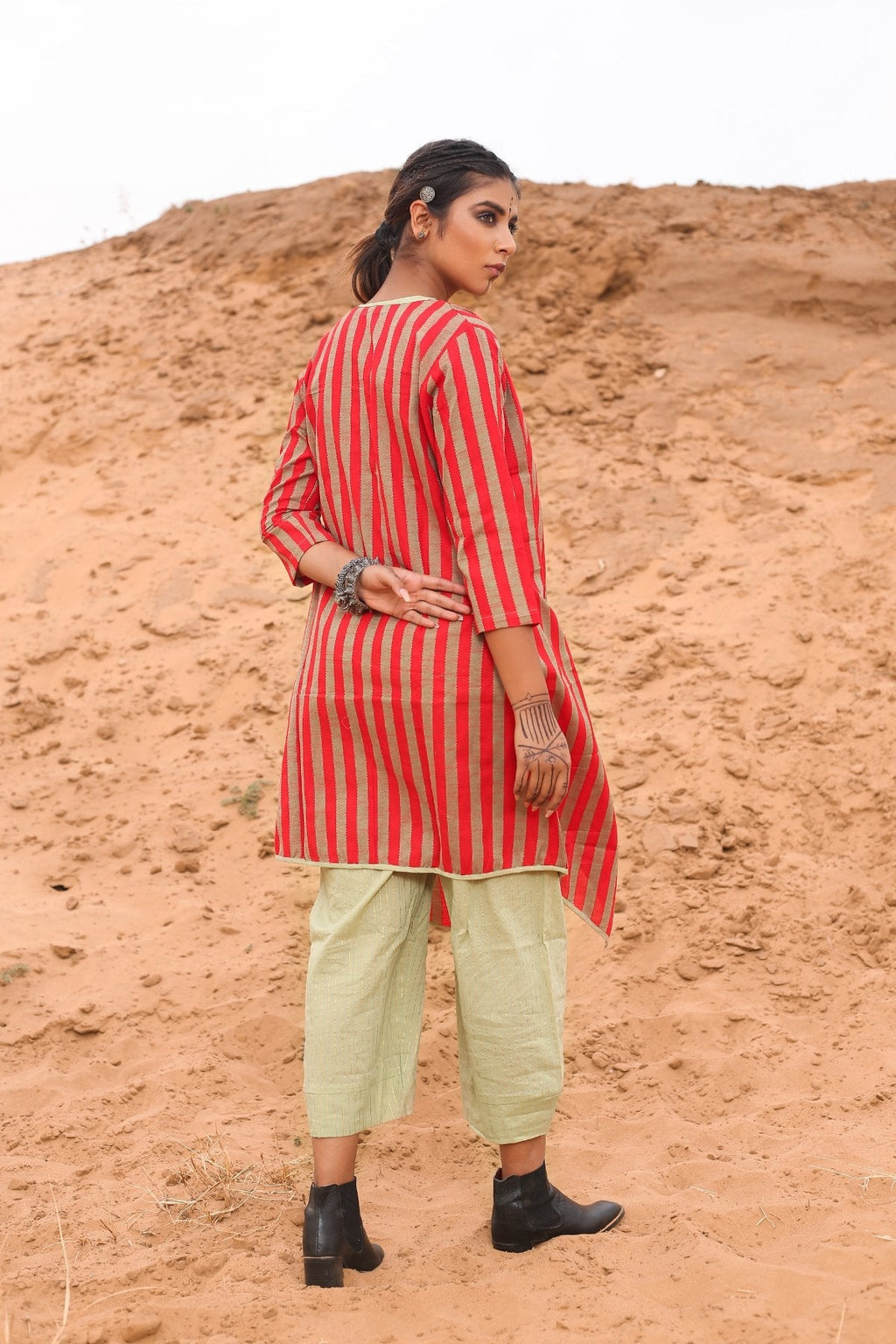 Top With Pants And Red Striped Cape - Set Of Three by Keva with Cape, Co-ord Sets, Cotton, Cotton Lurex, Desert Rose, Natural, Office Wear Co-ords, Red, Relaxed Fit, Resort Wear, Stripes, Travel, Travel Co-ords, Womenswear at Kamakhyaa for sustainable fashion