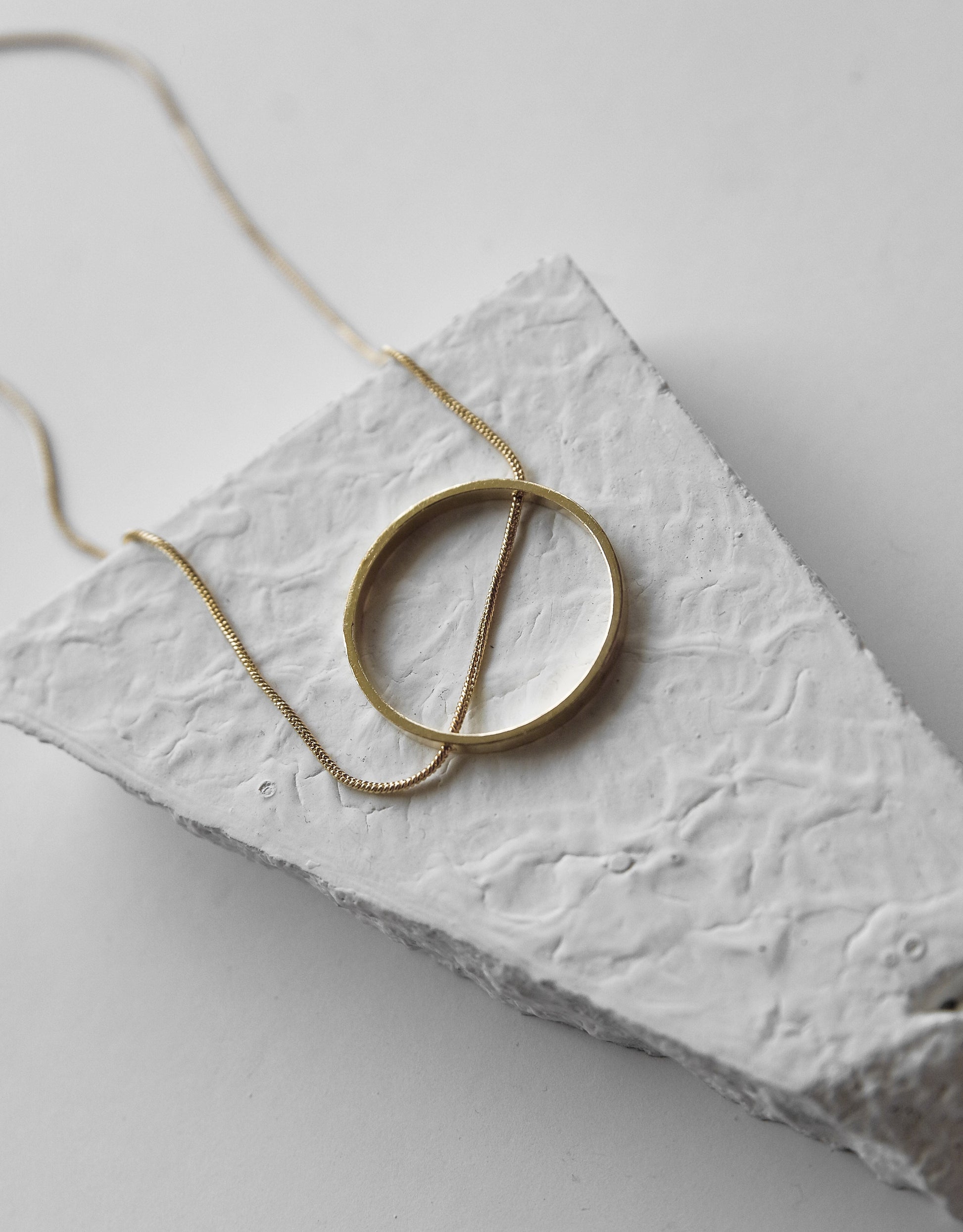 Gold Brass Necklaces-Slit A Circle Golden by De'anma with Brass, Fashion Jewellery, Free Size, Gold, Gold Plated, Gold Plated Brass, jewelry, Less than $50, Natural, Necklaces, Solids, Statement Jewellery at Kamakhyaa for sustainable fashion