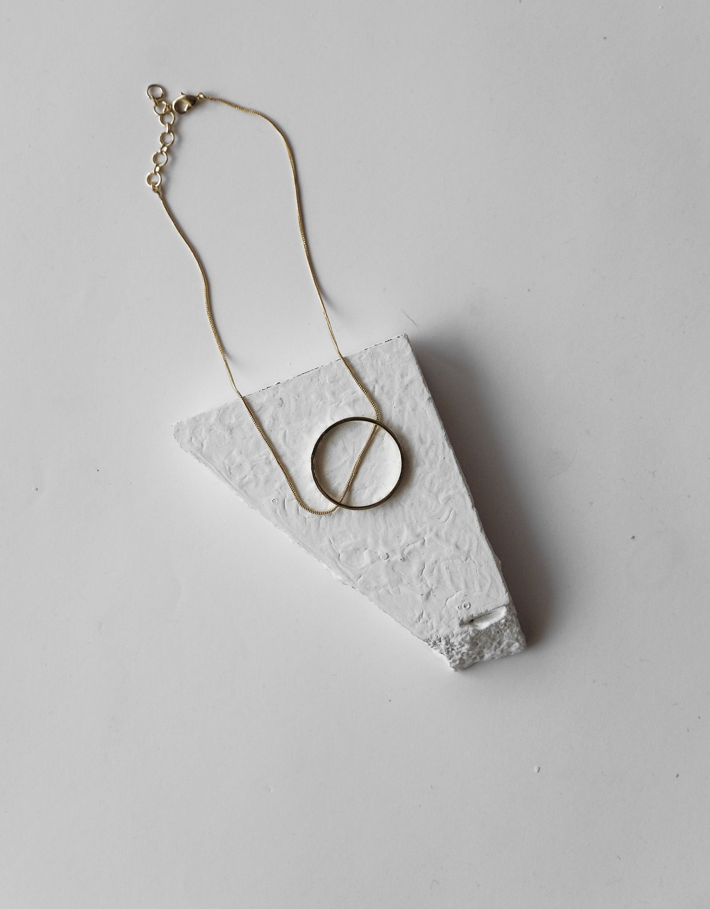 Gold Brass Necklaces-Slit A Circle Golden by De'anma with Brass, Fashion Jewellery, Free Size, Gold, Gold Plated, Gold Plated Brass, jewelry, Less than $50, Natural, Necklaces, Solids, Statement Jewellery at Kamakhyaa for sustainable fashion