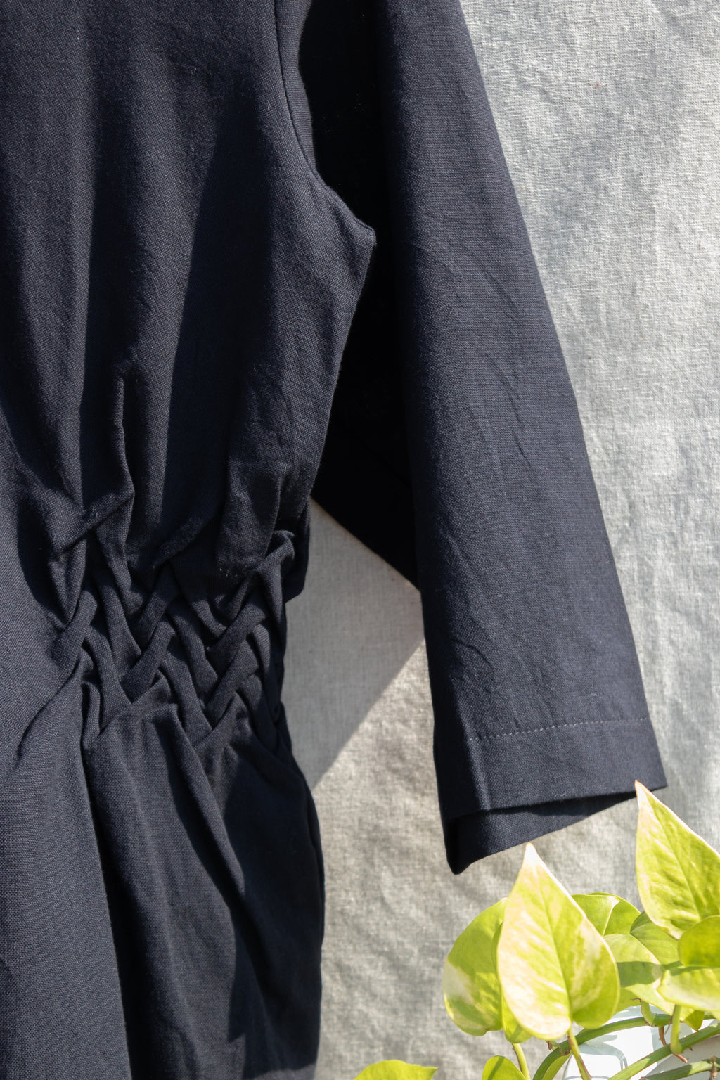 Black V-Neck Tunic Top by Anushé Pirani with Black, Blouses, Handwoven Cotton, July Sale, July Sale 2023, Natural, Office Wear, Regular Fit, sale anushe pirani, Solids, The Line Tales, The Line Tales by Anushe Pirani, Tops, Womenswear at Kamakhyaa for sustainable fashion