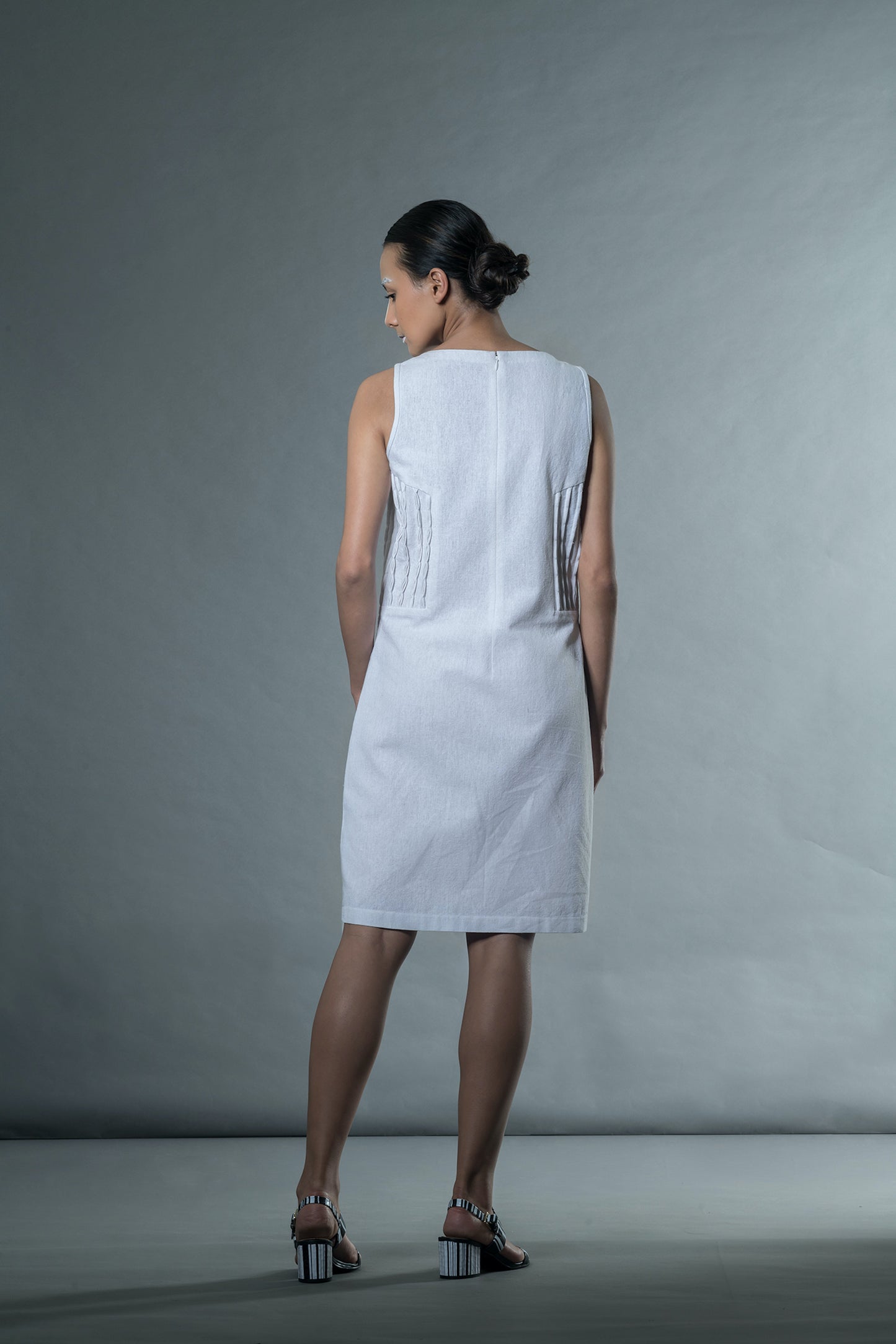 White Sleeveless Mini Dress by Anushé Pirani with Easter, Handwoven Jute Cotton, July Sale, July Sale 2023, Mini Dresses, Natural, Office Wear, Playful Office Wear, Relaxed Fit, sale anushe pirani, Sleeveless Dresses, Solids, The Line Tales, The Line Tales by Anushe Pirani, White, Womenswear at Kamakhyaa for sustainable fashion