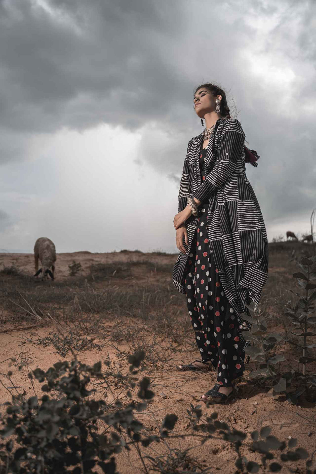 Printed Cotton Top With Block Printed Cape And Palazzo - Set Of 3 by Keva with Black, Block Prints, Cape, Co-ord Sets, Cotton, Natural, Relaxed Fit, Resort Wear, Vacation, Vacation Co-ords, Wild Child, Womenswear at Kamakhyaa for sustainable fashion