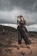 Printed Cotton Top With Block Printed Cape And Palazzo - Set Of 3 by Keva with Black, Block Prints, Cape, Co-ord Sets, Cotton, Natural, Relaxed Fit, Resort Wear, Vacation, Vacation Co-ords, Wild Child, Womenswear at Kamakhyaa for sustainable fashion