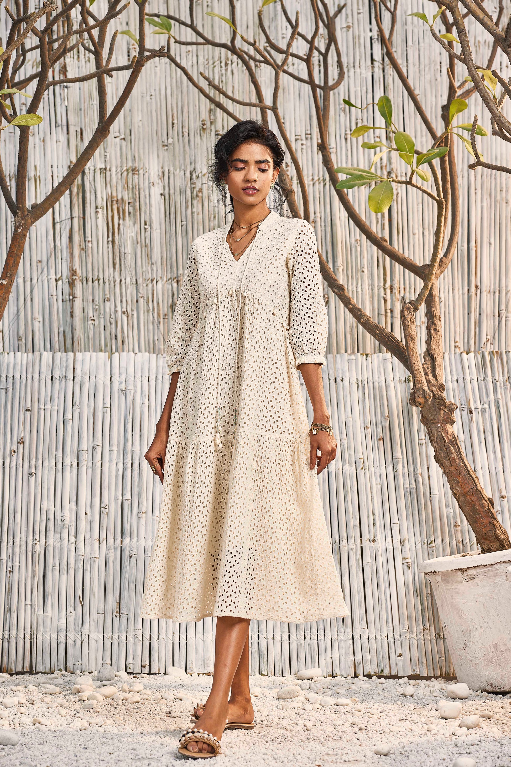 Breezy Cotton Cutwork Ivory Dress by Charkhee with Best Selling, Cotton, Cutwork, Kurtas, Midi Dresses, Natural, Regular Fit, Resort Wear, Schiffli, Shores 23, Textured, Tiered Dresses, White, Womenswear at Kamakhyaa for sustainable fashion