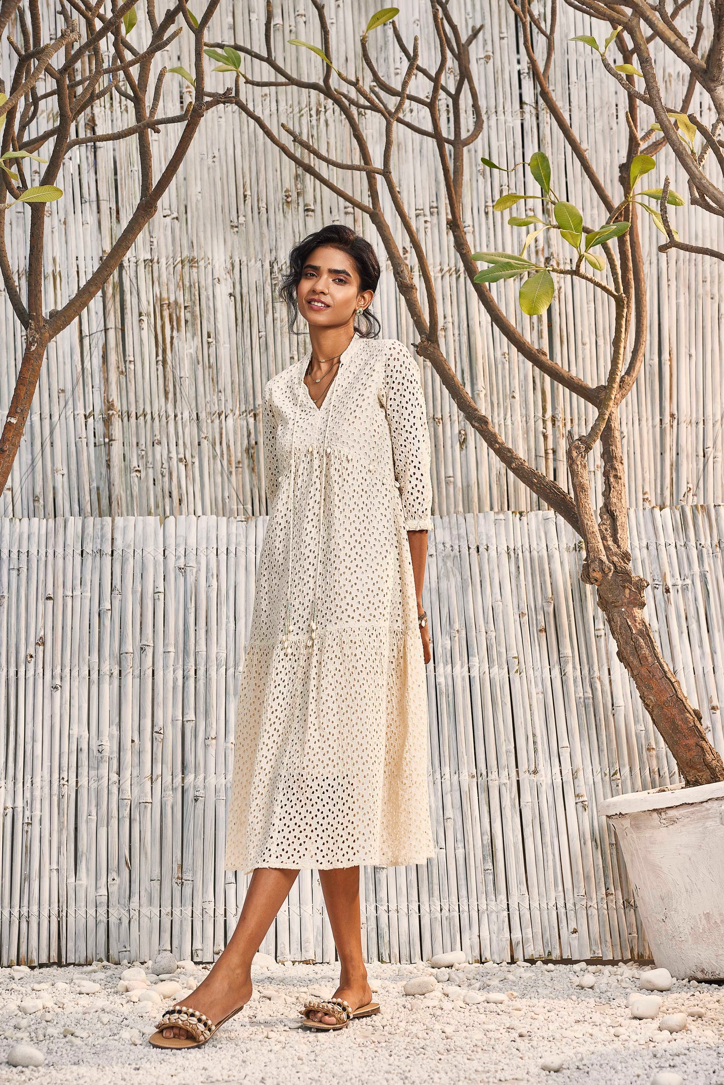 Breezy Cotton Cutwork Ivory Dress by Charkhee with Best Selling, Cotton, Cutwork, Kurtas, Midi Dresses, Natural, Regular Fit, Resort Wear, Schiffli, Shores 23, Textured, Tiered Dresses, White, Womenswear at Kamakhyaa for sustainable fashion