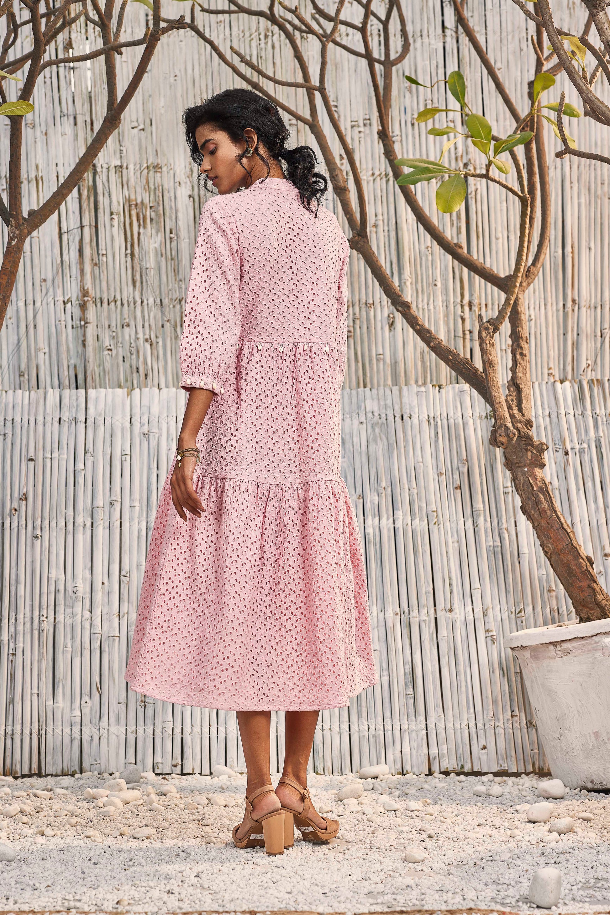 Breezy Cotton Cutwork Dress in Blush Pink by Charkhee with Cotton, Cutwork, Kurtas, Midi Dresses, Natural, Pink, Regular Fit, Resort Wear, Schiffli, Shores 23, Textured, Tiered Dresses, Womenswear at Kamakhyaa for sustainable fashion