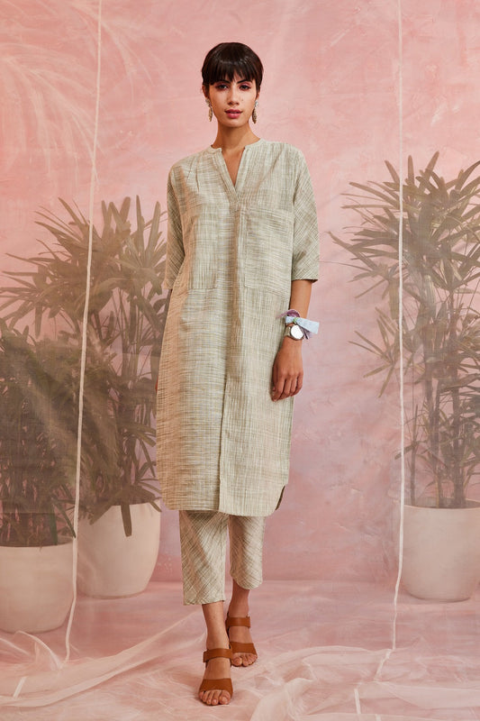 Green Pockets Texture Kurta with Pants by Charkhee with Casual Wear, Cotton, Green, Indian Wear, Kurta Pant Sets, Natural, Olive Green, Regular Fit, Sun-dae by Charkhee, Textured, Womenswear at Kamakhyaa for sustainable fashion