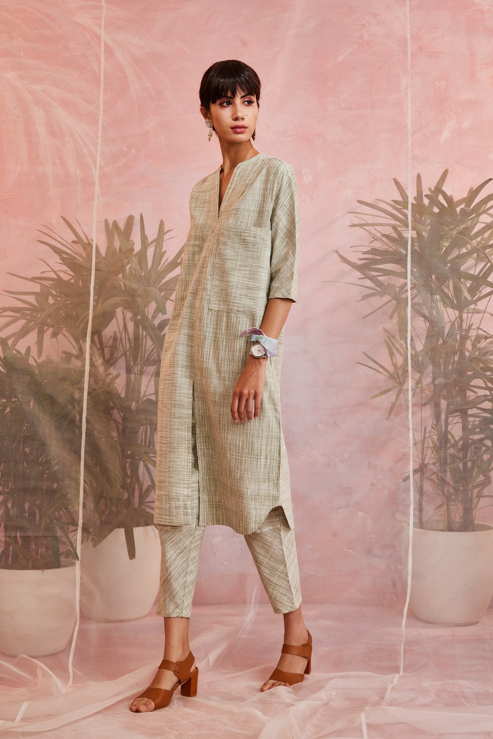 Green Pockets Texture Kurta with Pants by Charkhee with Casual Wear, Cotton, Green, Indian Wear, Kurta Pant Sets, Natural, Olive Green, Regular Fit, Sun-dae by Charkhee, Textured, Womenswear at Kamakhyaa for sustainable fashion
