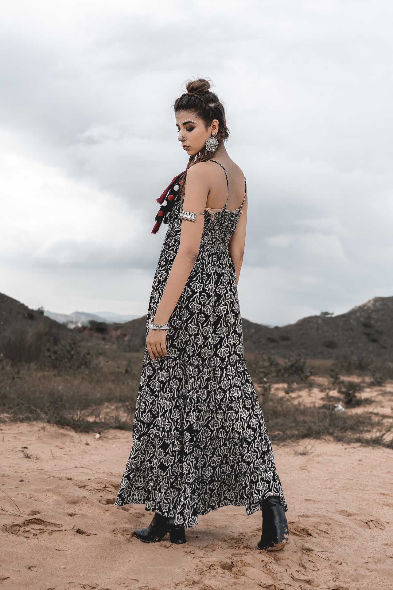 Spaghetti Tiered Block Printed Long Dress by Keva with Best Selling, Black, Block Prints, Cotton, FB ADS JUNE, Maxi Dresses, Natural, Printed Selfsame, Relaxed Fit, Resort Wear, Sleeveless Dresses, Strap Dresses, Tiered Dresses, Wild Child, Womenswear at Kamakhyaa for sustainable fashion
