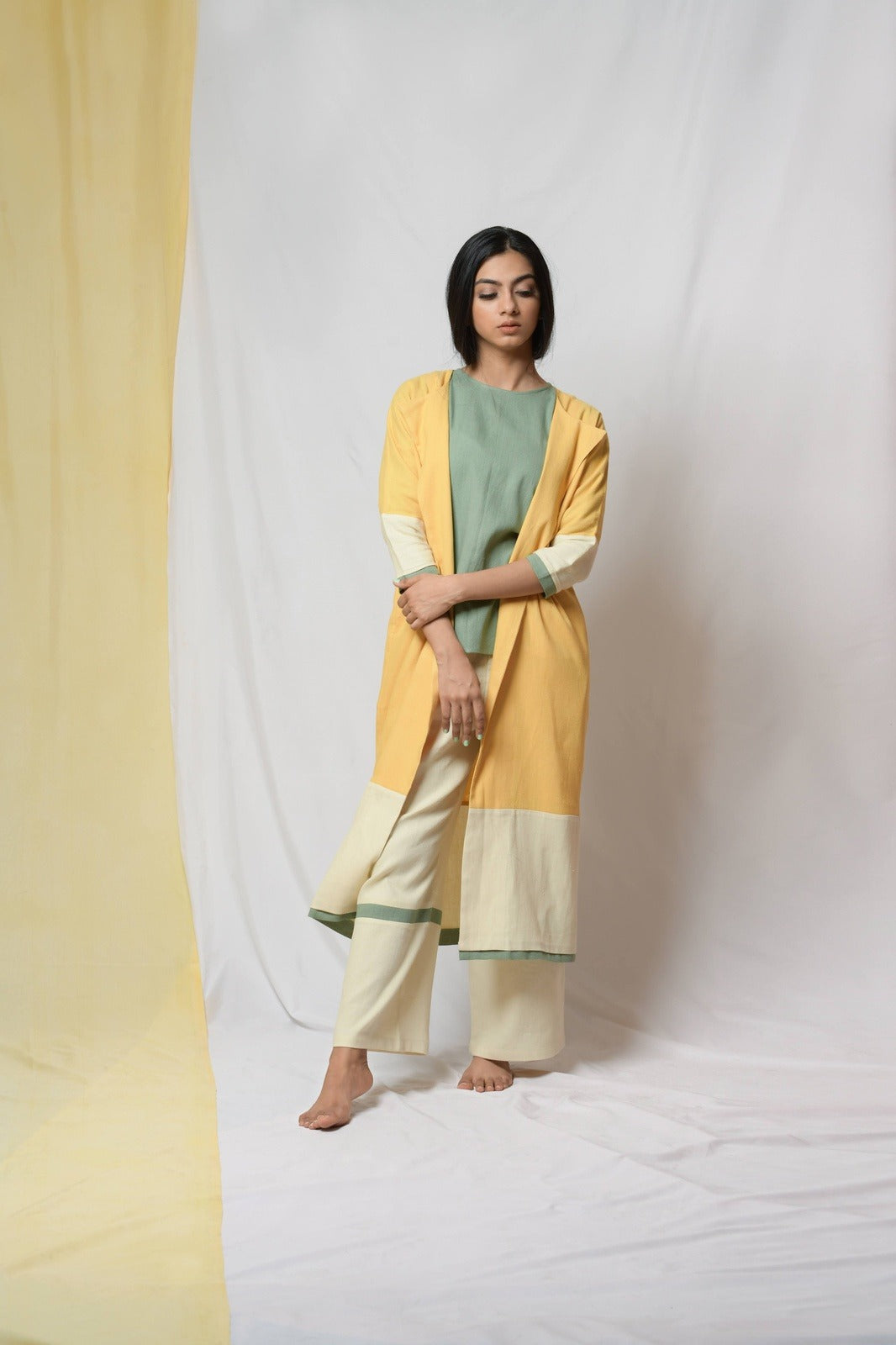 Yellow Roving Dunes Jacket by Niraa with Coats, Cotton khadi, Evening Wear, Natural with azo dyes, Relaxed Fit, Solids, Tales of rippling brooks, Womenswear, Yellow at Kamakhyaa for sustainable fashion