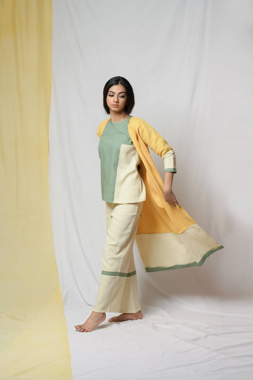 Yellow Roving Dunes Jacket by Niraa with Coats, Cotton khadi, Evening Wear, Natural with azo dyes, Relaxed Fit, Solids, Tales of rippling brooks, Womenswear, Yellow at Kamakhyaa for sustainable fashion