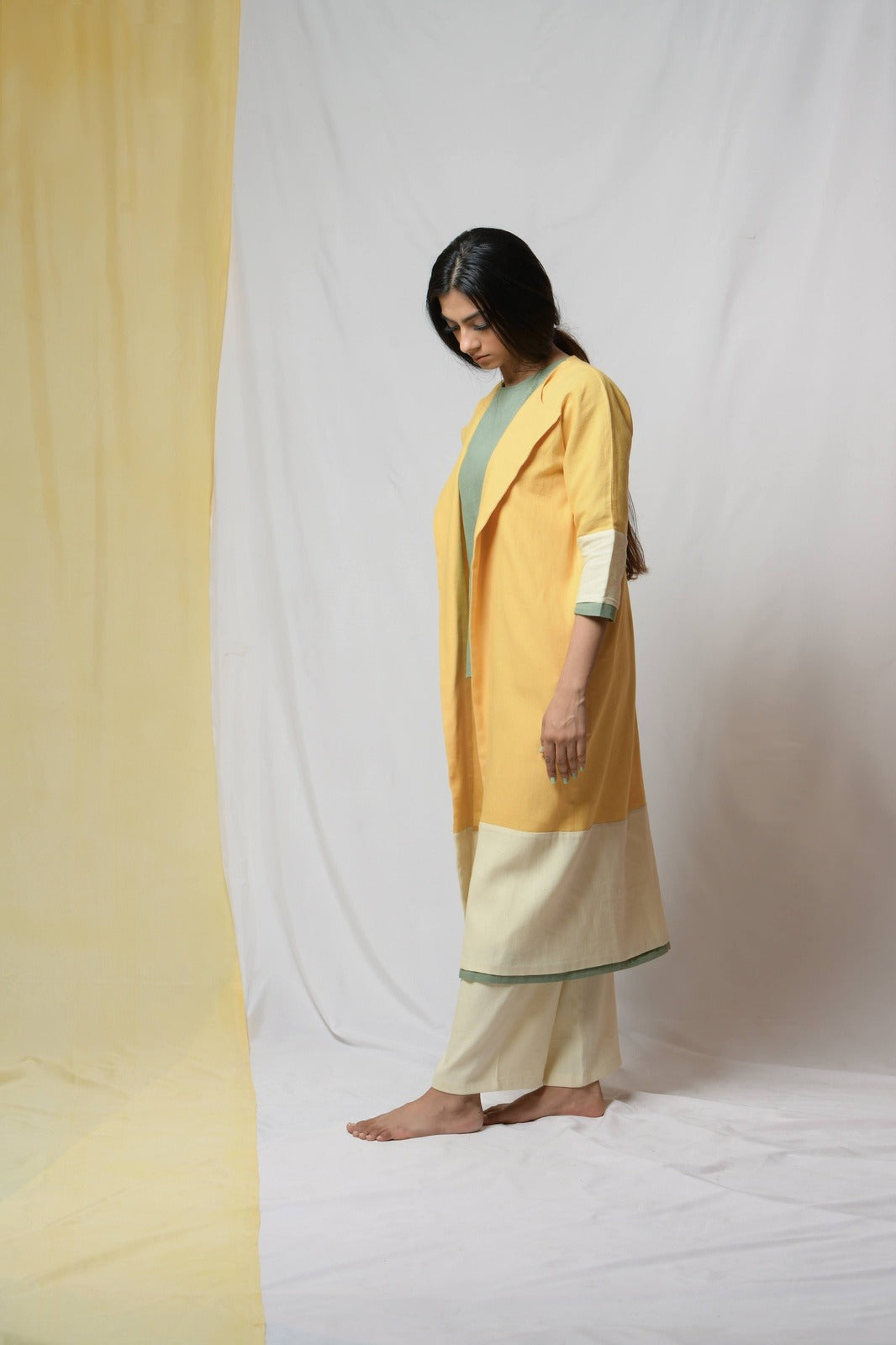 Yellow Roving Dunes Jacket by Niraa with Coats, Cotton khadi, Evening Wear, Natural with azo dyes, Relaxed Fit, Solids, Tales of rippling brooks, Womenswear, Yellow at Kamakhyaa for sustainable fashion