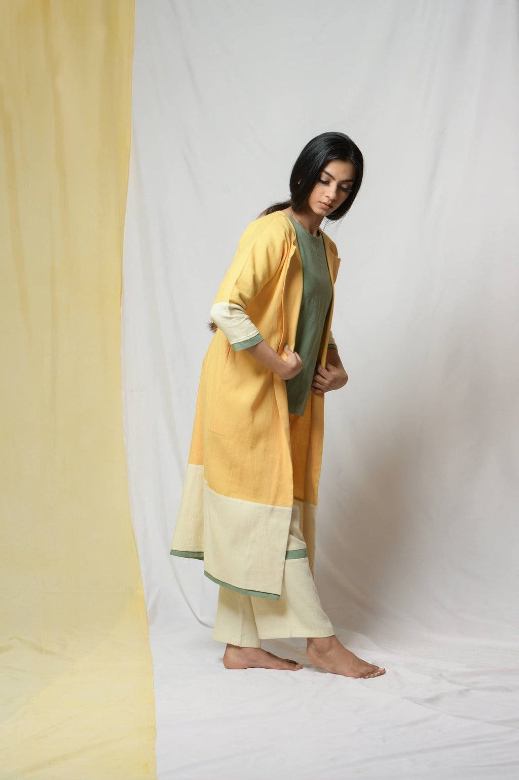 Yellow Roving Dunes Jacket by Niraa with Coats, Cotton khadi, Evening Wear, Natural with azo dyes, Relaxed Fit, Solids, Tales of rippling brooks, Womenswear, Yellow at Kamakhyaa for sustainable fashion