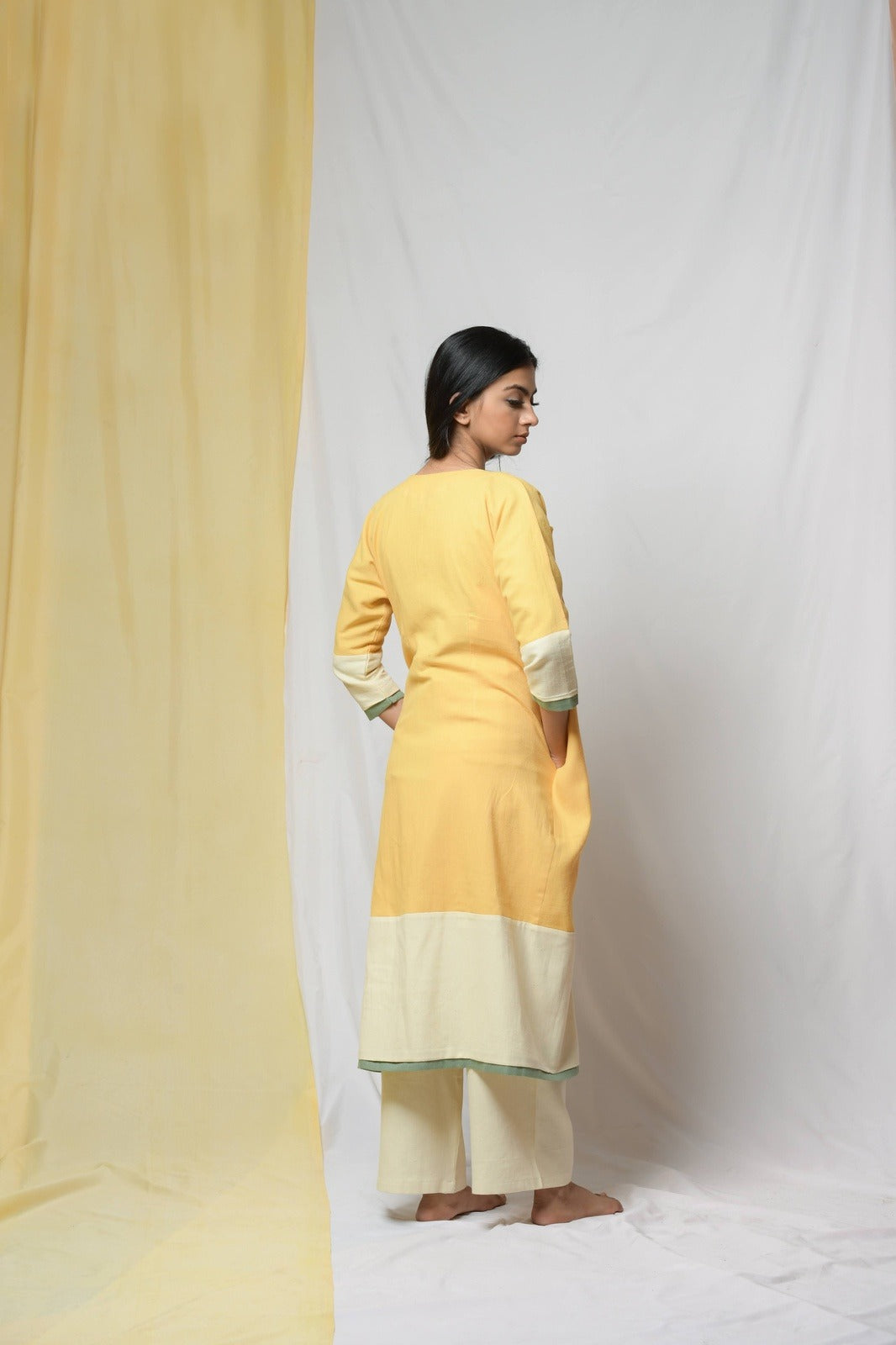 Yellow Roving Dunes Jacket by Niraa with Coats, Cotton khadi, Evening Wear, Natural with azo dyes, Relaxed Fit, Solids, Tales of rippling brooks, Womenswear, Yellow at Kamakhyaa for sustainable fashion
