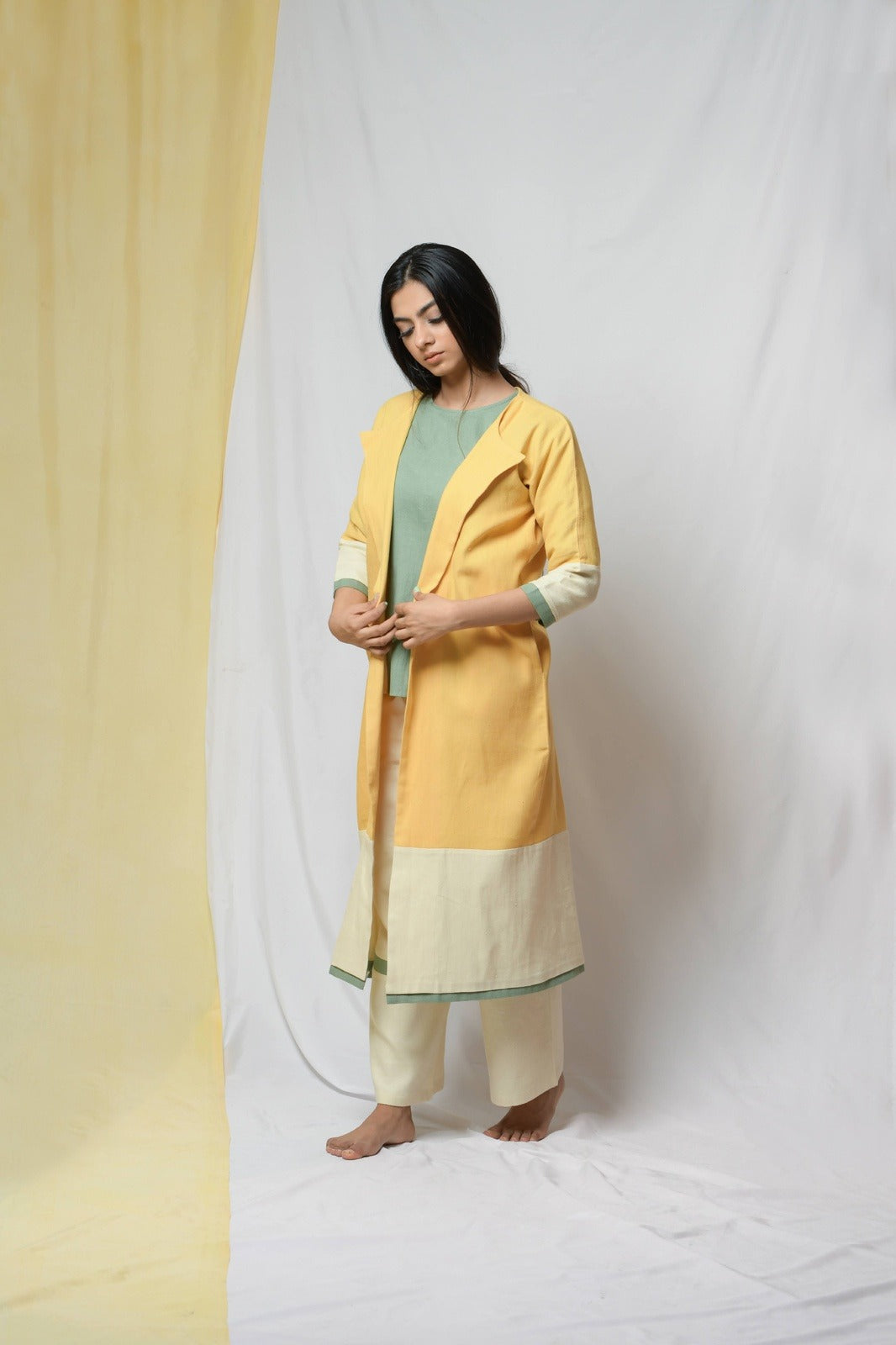 Yellow Roving Dunes Jacket by Niraa with Coats, Cotton khadi, Evening Wear, Natural with azo dyes, Relaxed Fit, Solids, Tales of rippling brooks, Womenswear, Yellow at Kamakhyaa for sustainable fashion