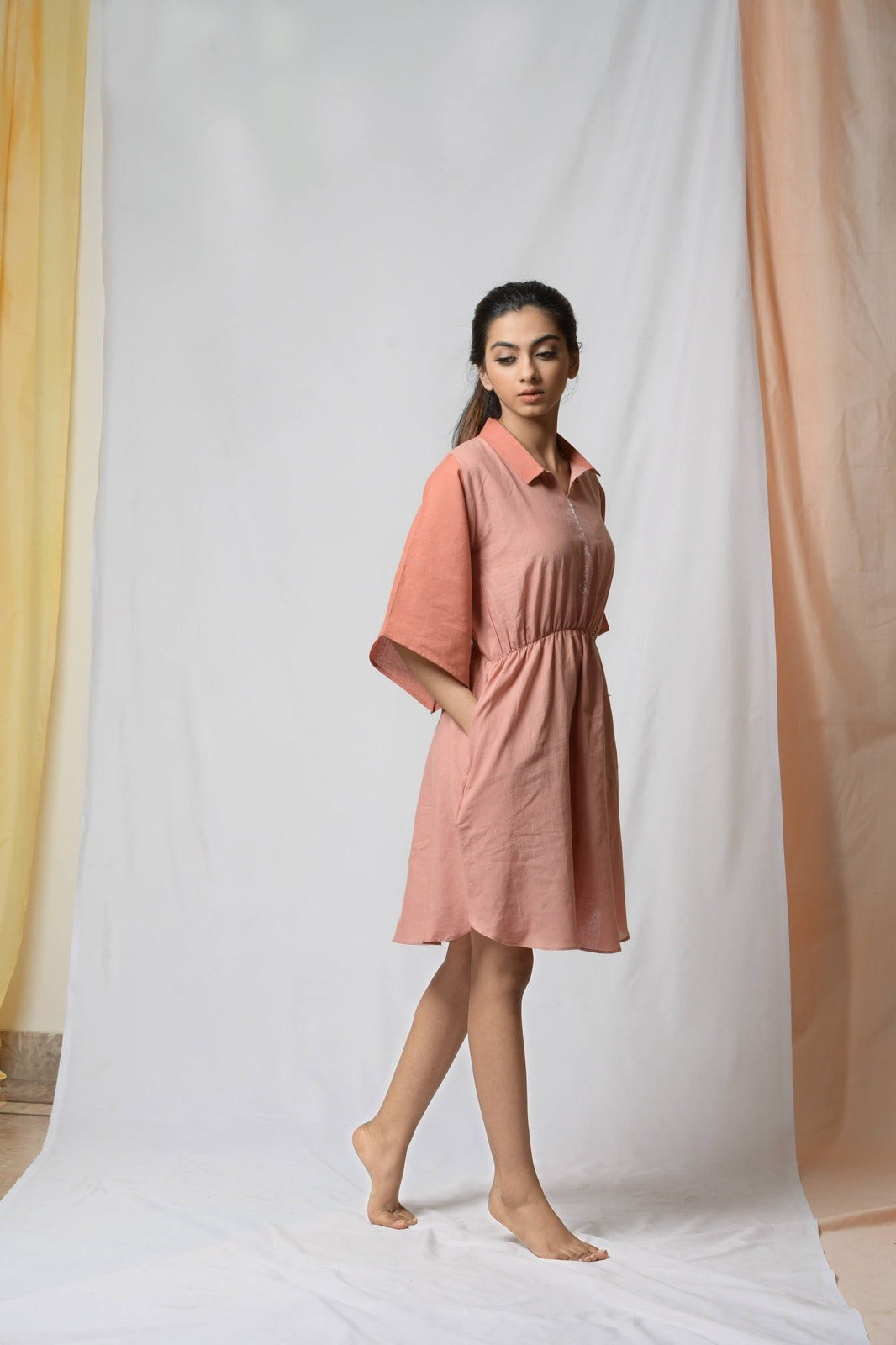 Battle To Breathe Peach Midi Dress by Niraa with Casual Wear, Cotton khadi, Mini Dresses, Natural with azo dyes, Peach, Regular Fit, Shirt Dresses, Solids, Tales of rippling brooks, Womenswear at Kamakhyaa for sustainable fashion