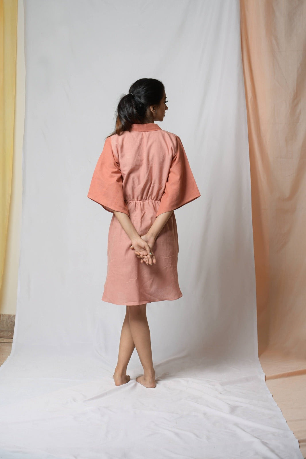 Battle To Breathe Peach Midi Dress by Niraa with Casual Wear, Cotton khadi, Mini Dresses, Natural with azo dyes, Peach, Regular Fit, Shirt Dresses, Solids, Tales of rippling brooks, Womenswear at Kamakhyaa for sustainable fashion