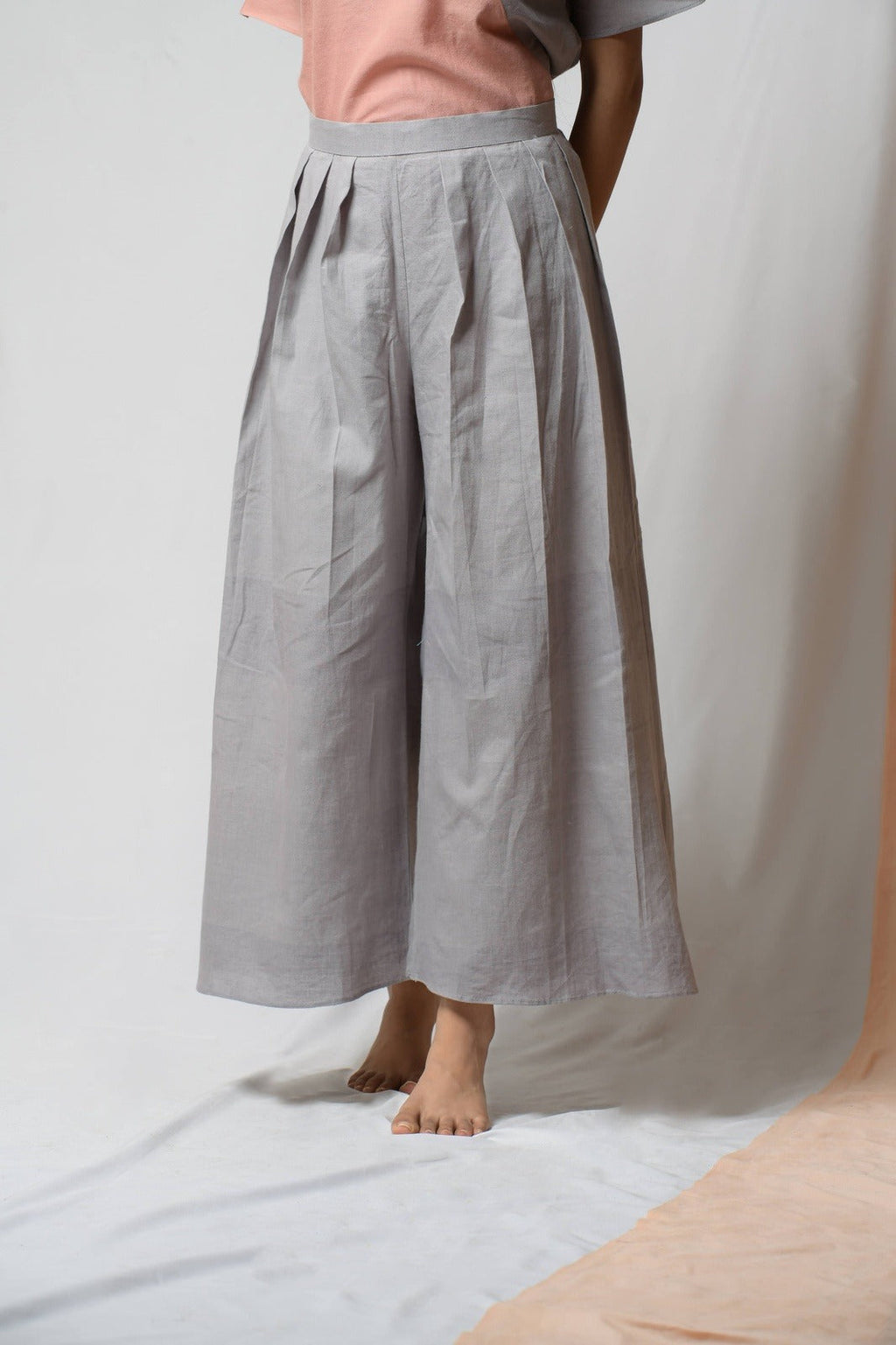 Grey Cotton Khadi Pants by Niraa with Casual Wear, Cotton khadi, Grey, Natural with azo dyes, Palazzo Pants, Relaxed Fit, Solids, Tales of rippling brooks, Womenswear at Kamakhyaa for sustainable fashion