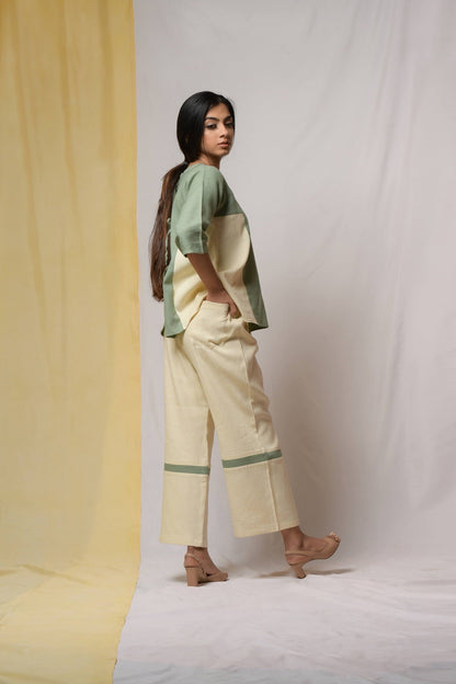 Off-white Bliss Of Life Trousers by Niraa with Cotton khadi, Natural with azo dyes, Off-white, Office Wear, Regular Fit, Solids, Tales of rippling brooks, Trousers, Womenswear at Kamakhyaa for sustainable fashion