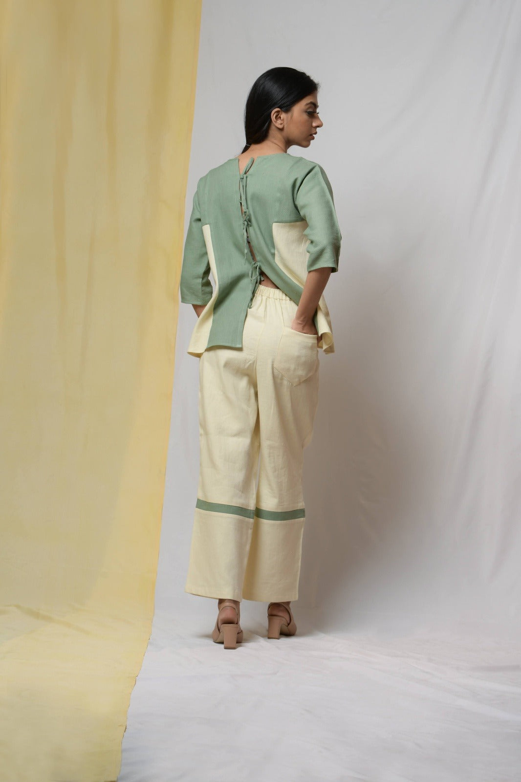 Off-white Bliss Of Life Trousers by Niraa with Cotton khadi, Natural with azo dyes, Off-white, Office Wear, Regular Fit, Solids, Tales of rippling brooks, Trousers, Womenswear at Kamakhyaa for sustainable fashion