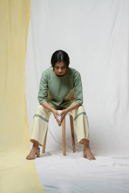 Off-white Bliss Of Life Trousers by Niraa with Cotton khadi, Natural with azo dyes, Off-white, Office Wear, Regular Fit, Solids, Tales of rippling brooks, Trousers, Womenswear at Kamakhyaa for sustainable fashion