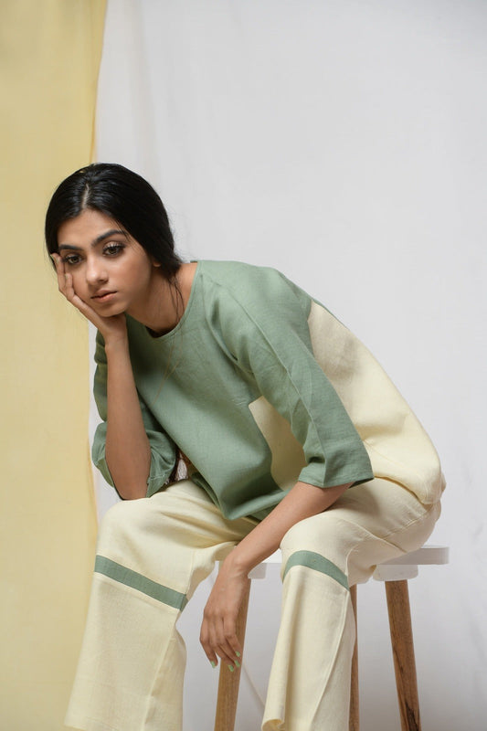 Off-white Bliss Of Life Trousers by Niraa with Cotton khadi, Natural with azo dyes, Off-white, Office Wear, Regular Fit, Solids, Tales of rippling brooks, Trousers, Womenswear at Kamakhyaa for sustainable fashion