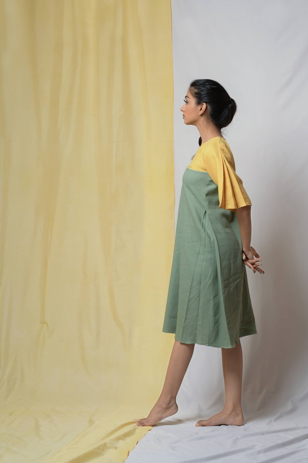 Green Estella Maxi Dress by Niraa with Casual Wear, Cotton khadi, Fitted At Bust, Green, Midi Dresses, Natural with azo dyes, Solids, Tales of rippling brooks, Womenswear at Kamakhyaa for sustainable fashion