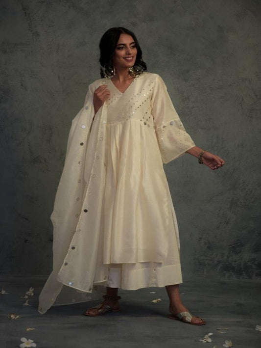 Off-white Bell Sleeves Kurta Set by Charkhee with Chanderi, Cotton, Embellished, Ethnic Wear, Indian Wear, Kurta Palazzo Sets, Kurta Set With Dupatta, Mirror Work, Natural, Relaxed Fit, Tyohaar by Charkhee, White, Womenswear at Kamakhyaa for sustainable fashion