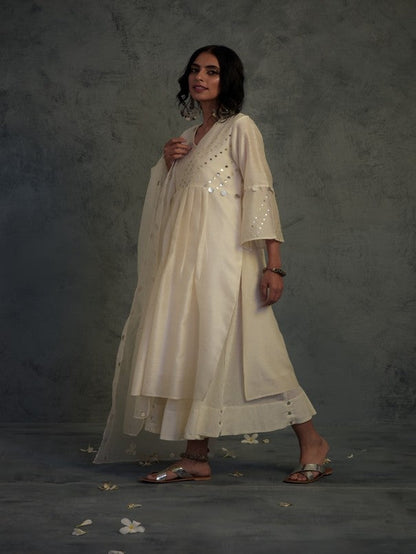 Off-white Bell Sleeves Kurta Set by Charkhee with Chanderi, Cotton, Embellished, Ethnic Wear, Indian Wear, Kurta Palazzo Sets, Kurta Set With Dupatta, Mirror Work, Natural, Relaxed Fit, Tyohaar by Charkhee, White, Womenswear at Kamakhyaa for sustainable fashion