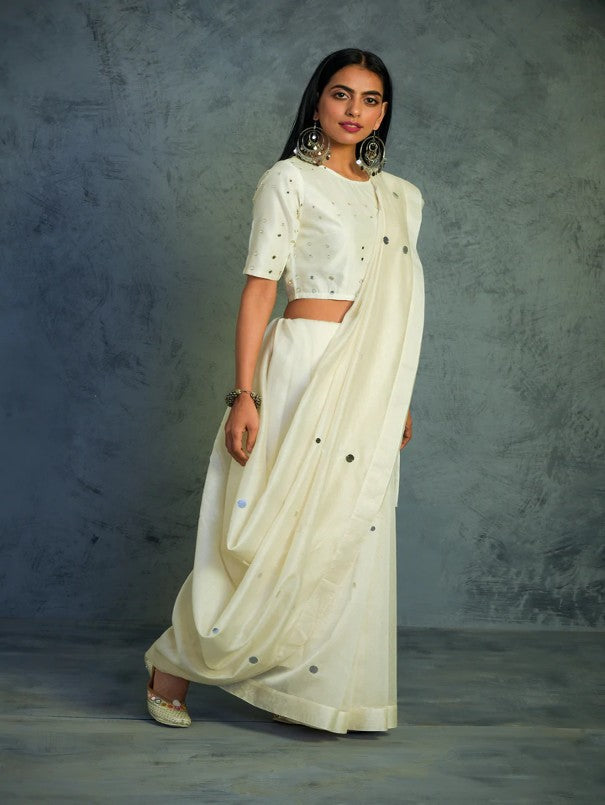 Chanderi Off-white Saree With Off-white Blouse by Charkhee with Chanderi, Cotton, Embellished, Ethnic Wear, Indian Wear, Mirror Work, Natural, Relaxed Fit, Saree Sets, Tyohaar by Charkhee, White, Womenswear at Kamakhyaa for sustainable fashion