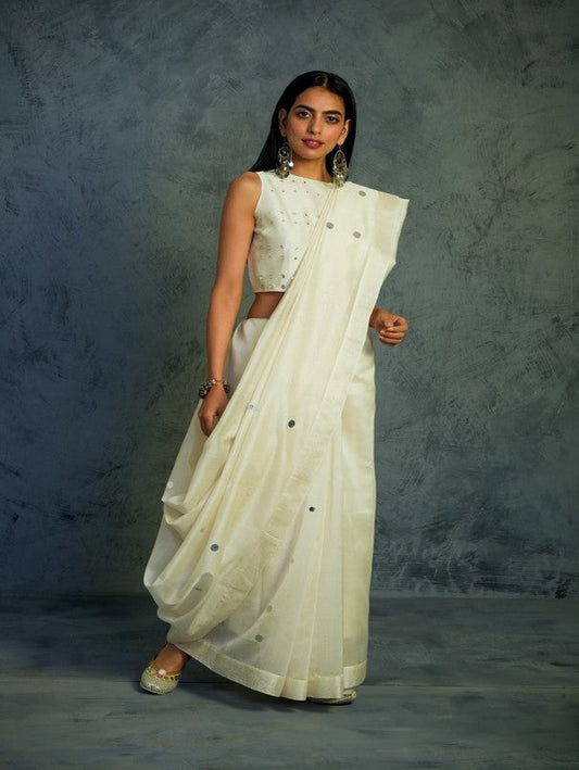 Chanderi Off-white Saree With Blouse by Charkhee with Chanderi, Cotton, Embellished, Ethnic Wear, Indian Wear, Mirror Work, Natural, Relaxed Fit, Saree Sets, Tyohaar by Charkhee, White, Womenswear at Kamakhyaa for sustainable fashion