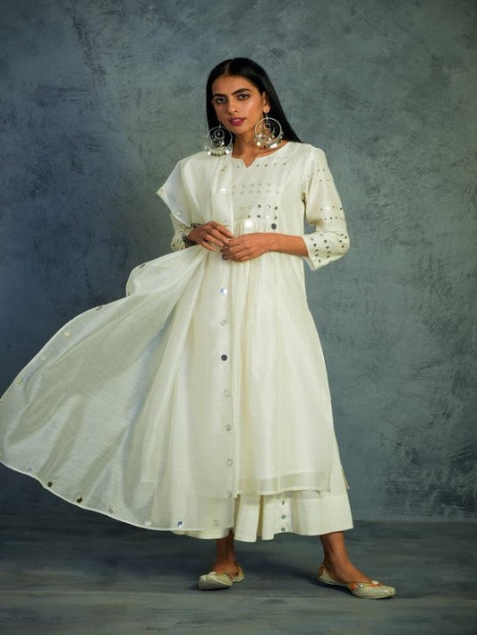 Off-white Gathered Kurta Set by Charkhee with Chanderi, Cotton, Embellished, Ethnic Wear, Indian Wear, Kurta Palazzo Sets, Kurta Set With Dupatta, Mirror Work, Natural, Relaxed Fit, Tyohaar by Charkhee, White, Womenswear at Kamakhyaa for sustainable fashion