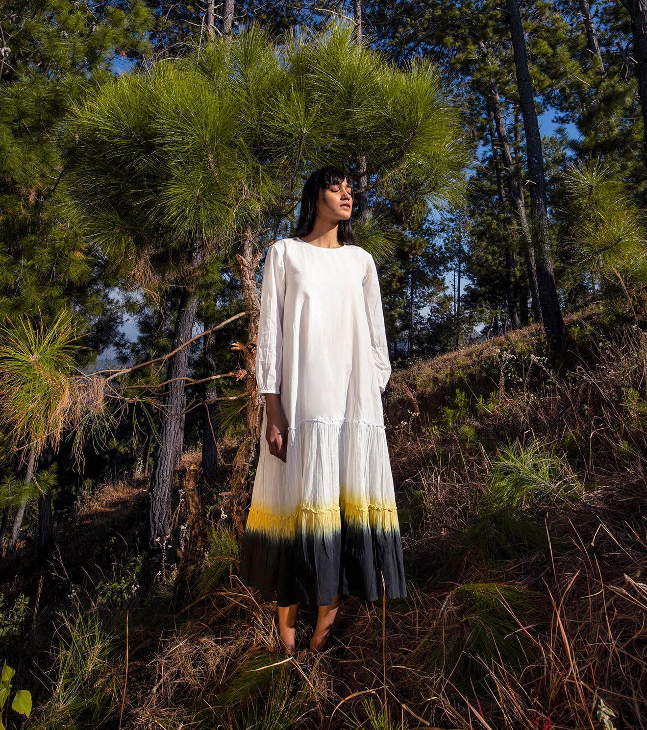 White Midi Dress at Kamakhyaa by Khara Kapas. This item is Midi Dresses, Mul Cotton, Natural, Regular Fit, Solid Selfmade, Solids, Tiered Dresses, White, Wilderness, Womenswear