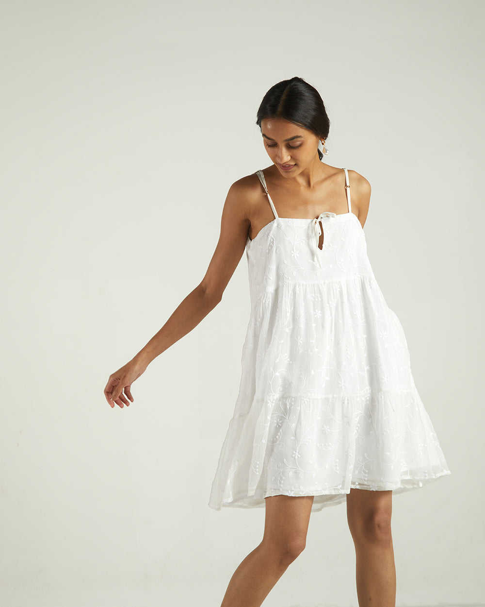 White Sleeveless Tier Dress by Reistor with A Summer Situation by Reistor, Bemberg, Best Selling, Casual Wear, Chiffon, FB ADS JUNE, Highend fashion, Mini Dresses, Natural, Sleeveless Dresses, Solids, White, Womenswear at Kamakhyaa for sustainable fashion