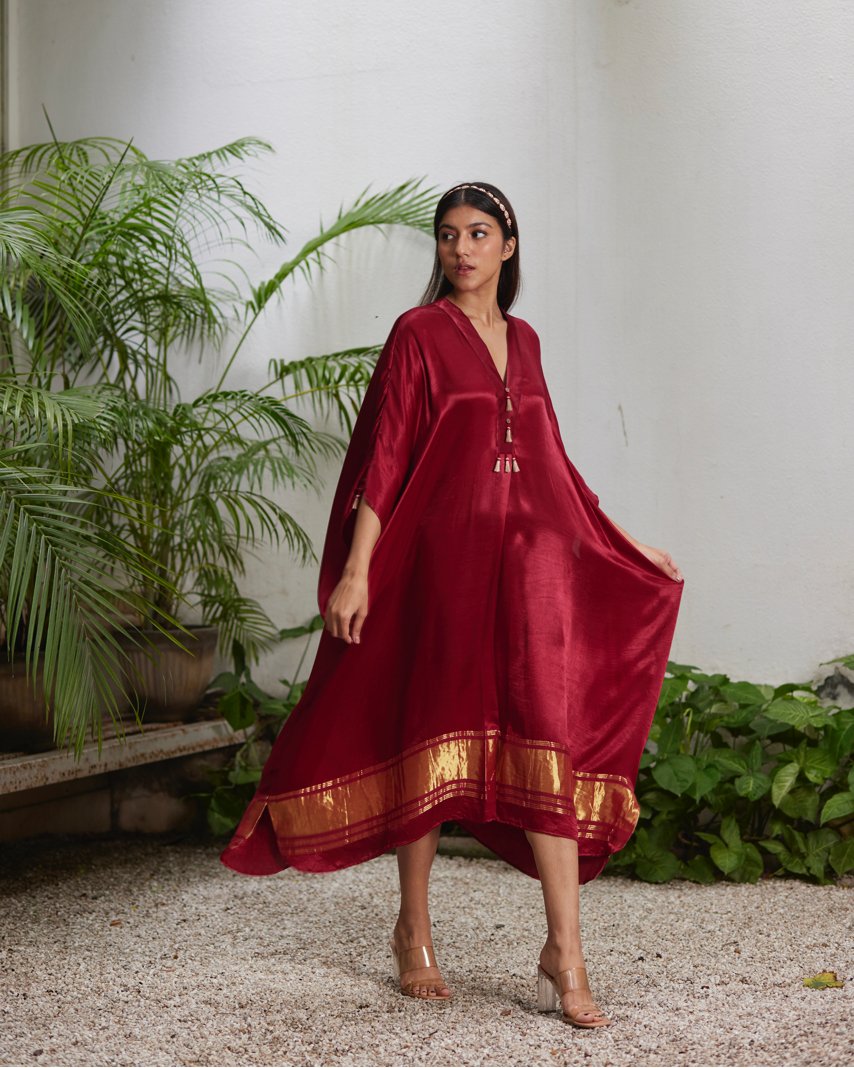 Red Silk Kaftan With Golden Border by Mayura Kumar with Ajrakh Heritage, Casual Wear, Dresses, Festive Wear, Kaftans, Mayura Kumar, Modal Silk, Red, Relaxed Fit, Solids, Womenswear at Kamakhyaa for sustainable fashion