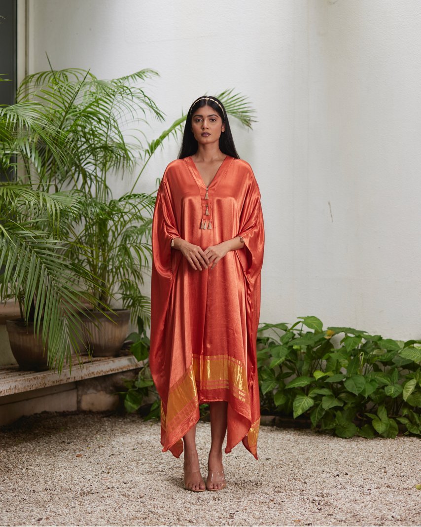 Orange Silk Kaftan With Golden Border by Mayura Kumar with Ajrakh Heritage, Casual Wear, Dresses, Festive Wear, Kaftans, Mayura Kumar, Modal Silk, Relaxed Fit, Solids, Womenswear at Kamakhyaa for sustainable fashion