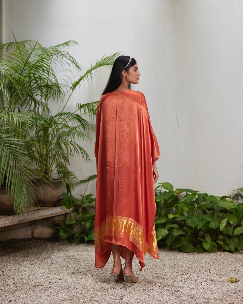 Orange Silk Kaftan With Golden Border by Mayura Kumar with Ajrakh Heritage, Casual Wear, Dresses, Festive Wear, Kaftans, Mayura Kumar, Modal Silk, Relaxed Fit, Solids, Womenswear at Kamakhyaa for sustainable fashion