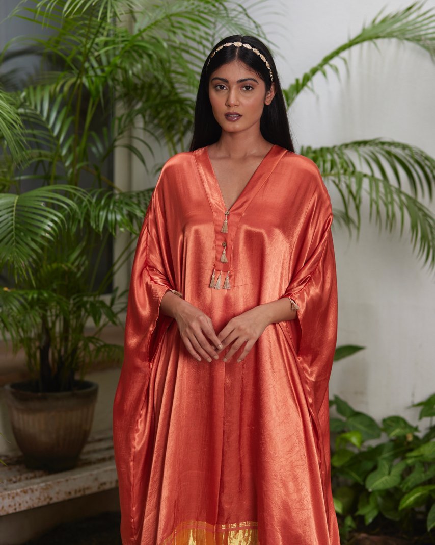 Orange Silk Kaftan With Golden Border by Mayura Kumar with Ajrakh Heritage, Casual Wear, Dresses, Festive Wear, Kaftans, Mayura Kumar, Modal Silk, Relaxed Fit, Solids, Womenswear at Kamakhyaa for sustainable fashion