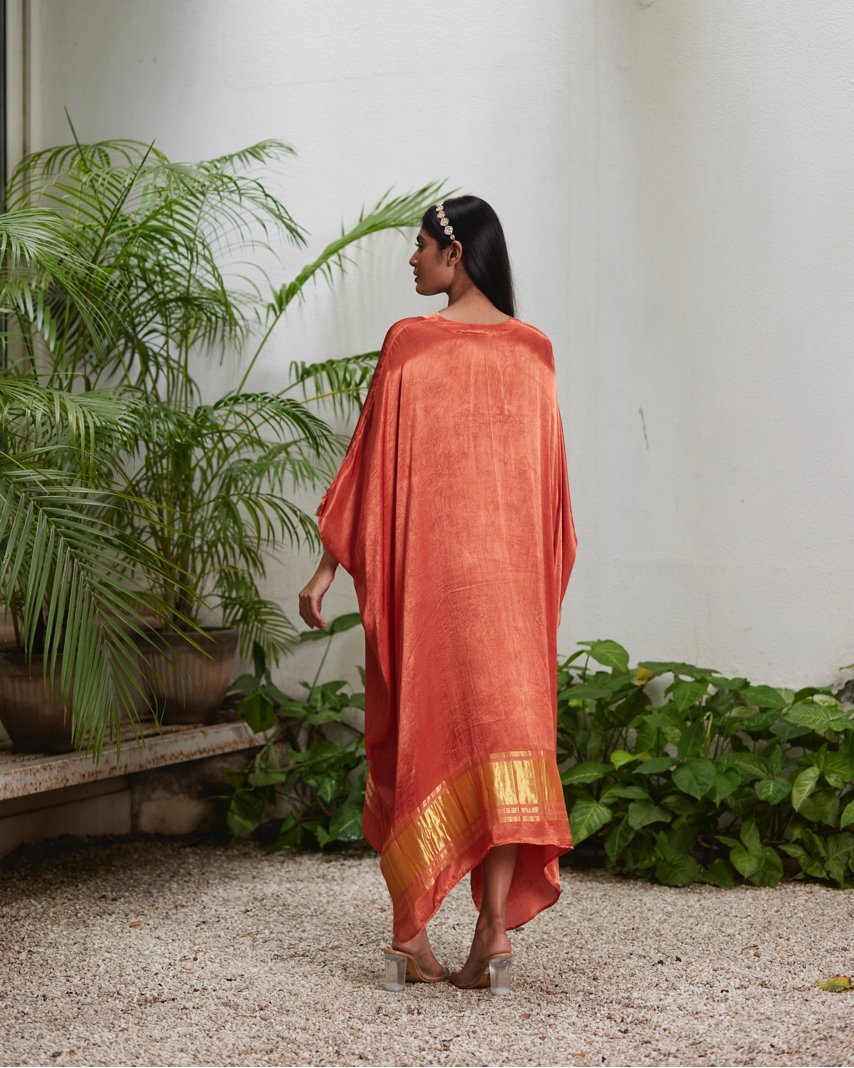 Orange Silk Kaftan With Golden Border by Mayura Kumar with Ajrakh Heritage, Casual Wear, Dresses, Festive Wear, Kaftans, Mayura Kumar, Modal Silk, Relaxed Fit, Solids, Womenswear at Kamakhyaa for sustainable fashion